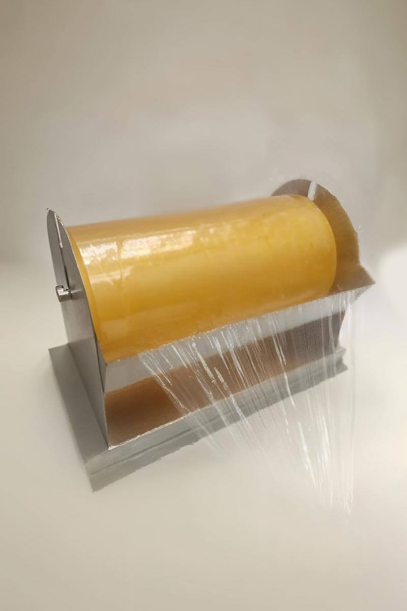 Dispensador para rollos de película plástica